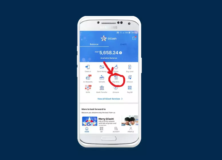 Launch the GCash app and tap "Pay Bills"